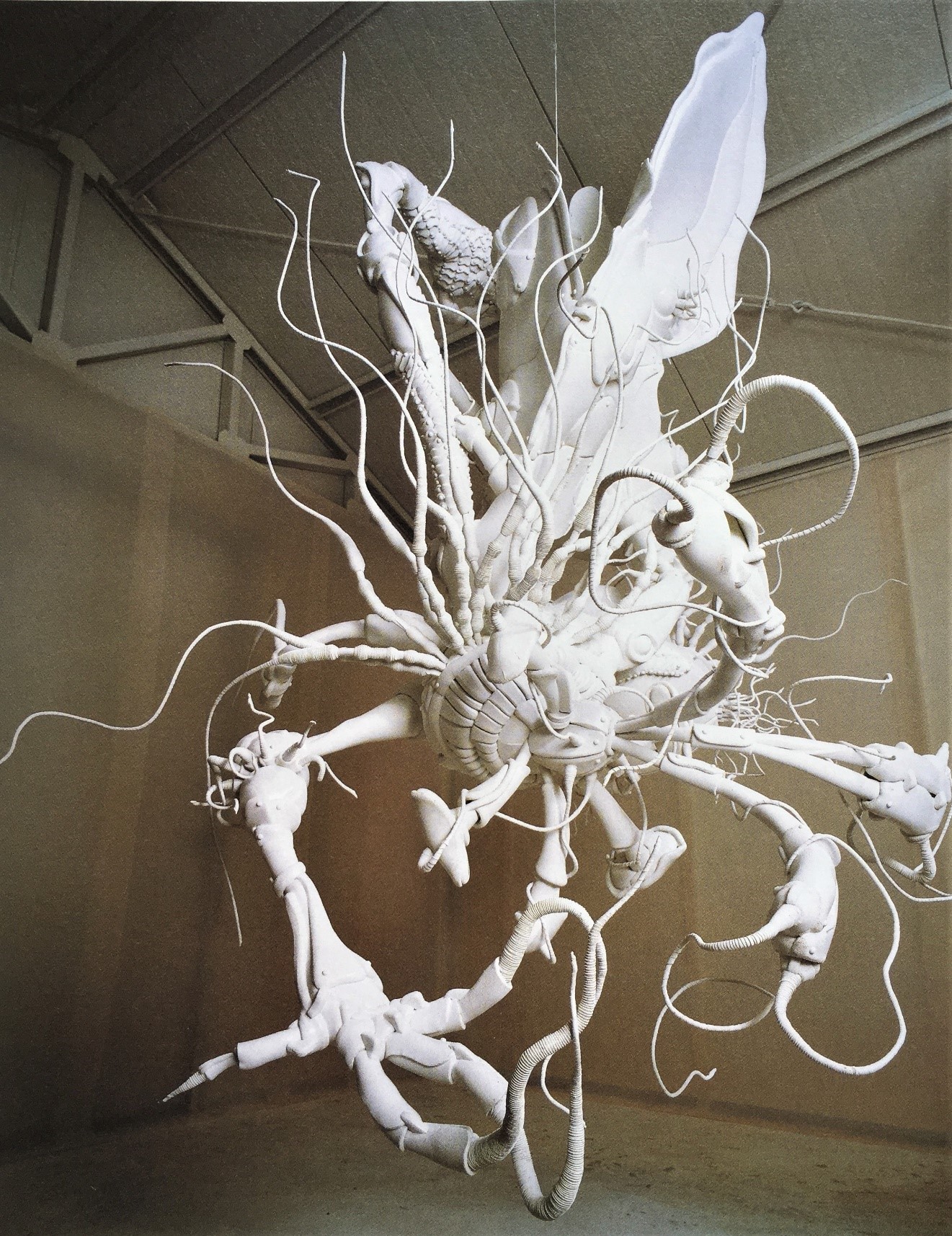Lee Bul, Amaryllis, 1999, multipart sculpture of cut polyurethane panels on an aluminum frame.